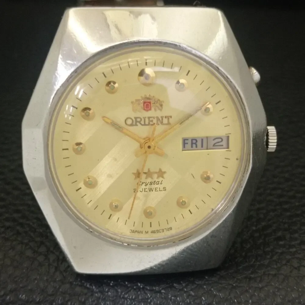 Vintage 1976 Orient Automatic Mens Silver Watch W/daydate & Gold accents
